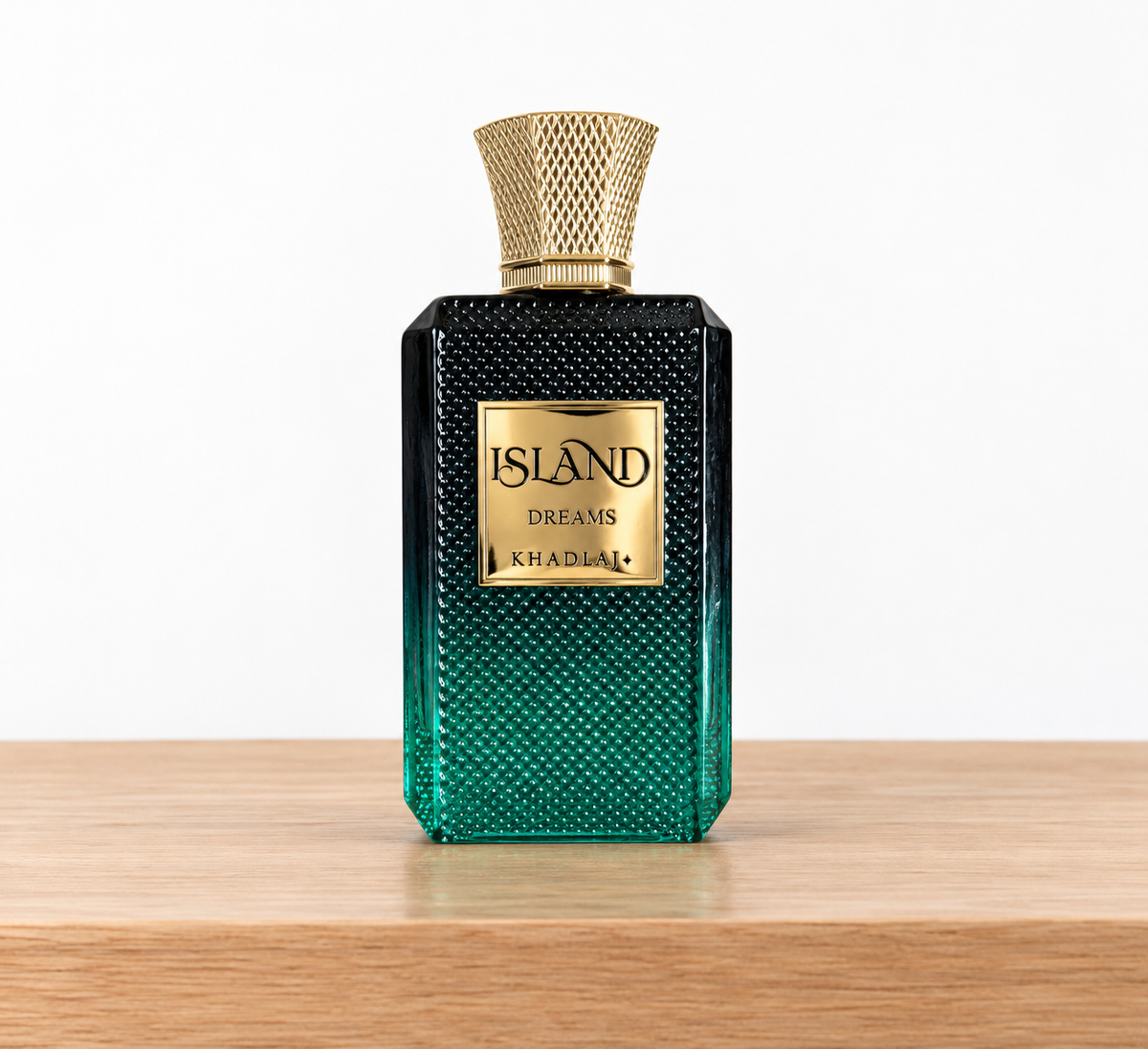 Khadlaj Island Dreams perfume bottle on white backdrop and oak shelf